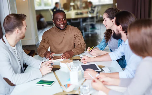 people around a table working
