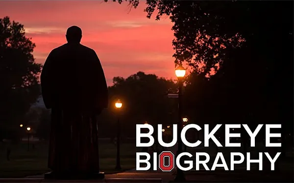 Thompson statue on the Oval silhouetted at sunset